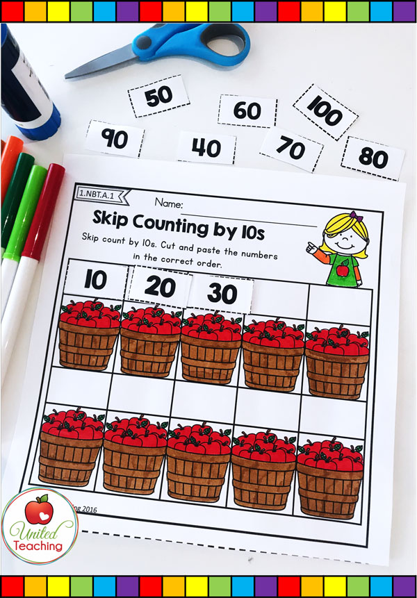 Skip counting by multiples of 10 apple themed math cut and paste worksheet.