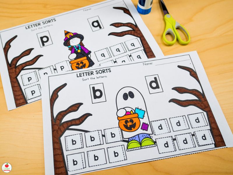 Letter reversal cut and paste sorting halloween worksheets for letters b and d, and p and q