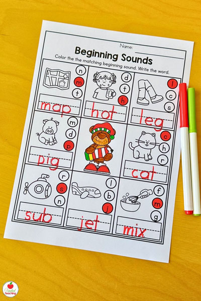 Beginning sounds Christmas-themed literacy worksheet for kindergarten.