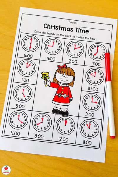 Time to the hour on analog clocks Christmas math worksheet