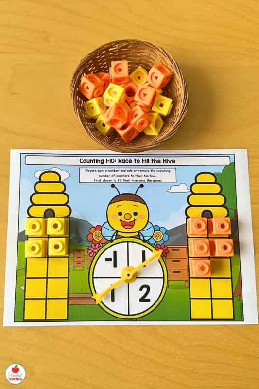 Spin and race to fill a ten frame hive Spring math center