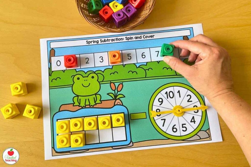 Spring spin, subtract and cover math center