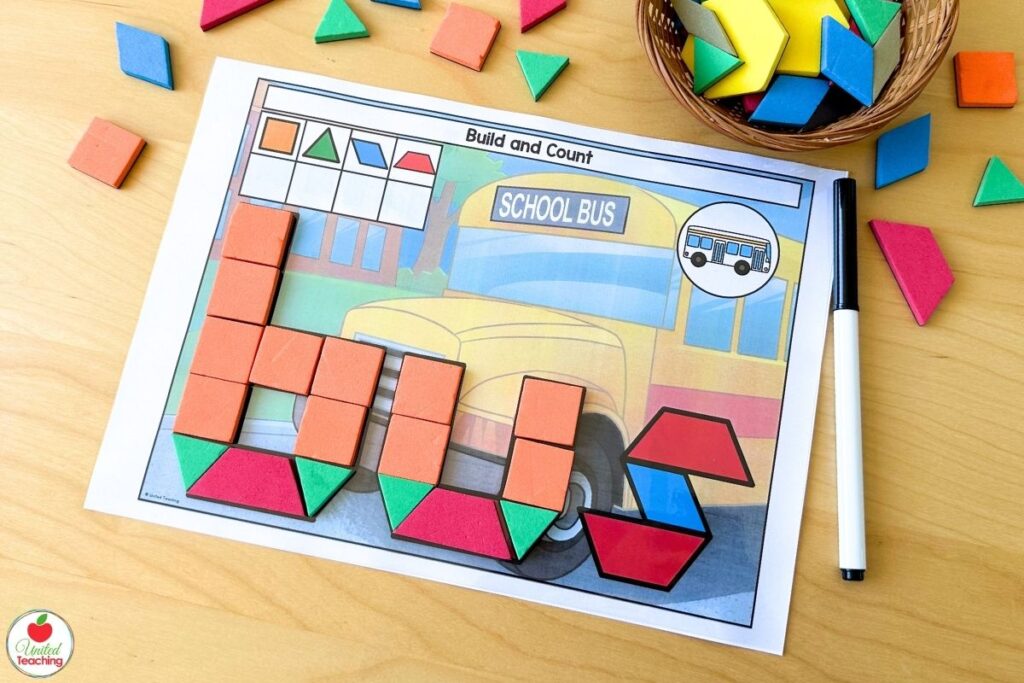 CVC word build and count pattern block mat with a school bus theme, where students build letter shapes from blocks and record how many of each shape they used