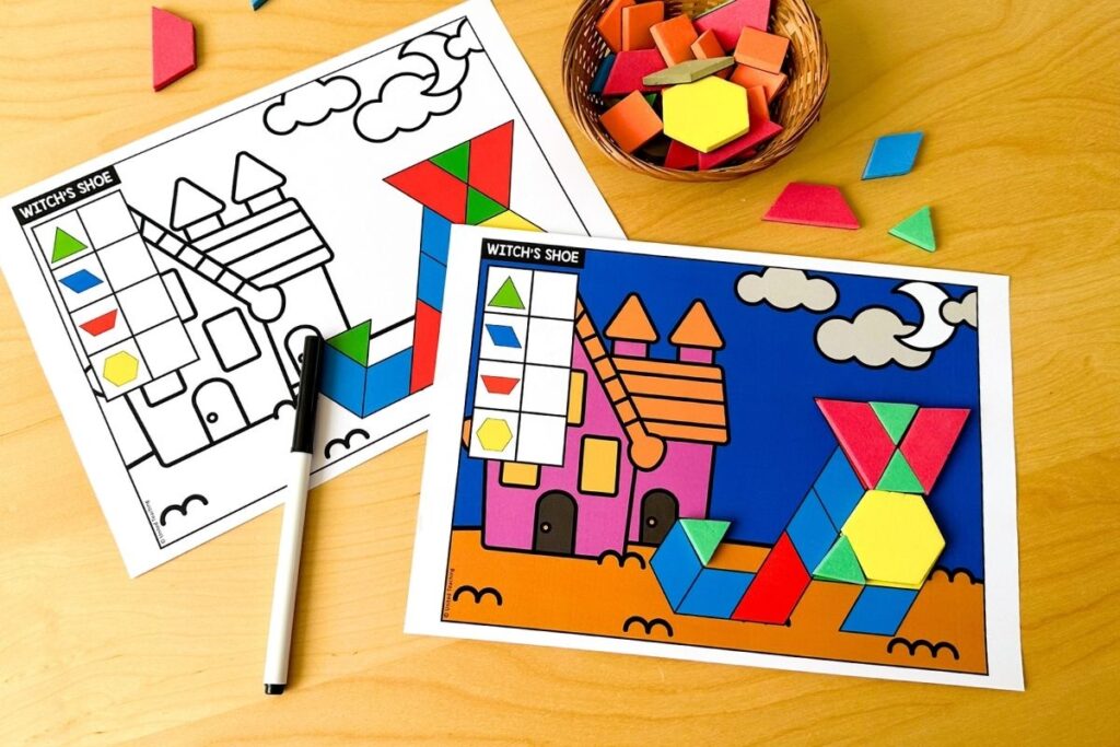 Two Halloween witch's shoe pattern block mats showing a black and white template alongside a coloured version with a haunted castle scene, where students build the image and record each shape used