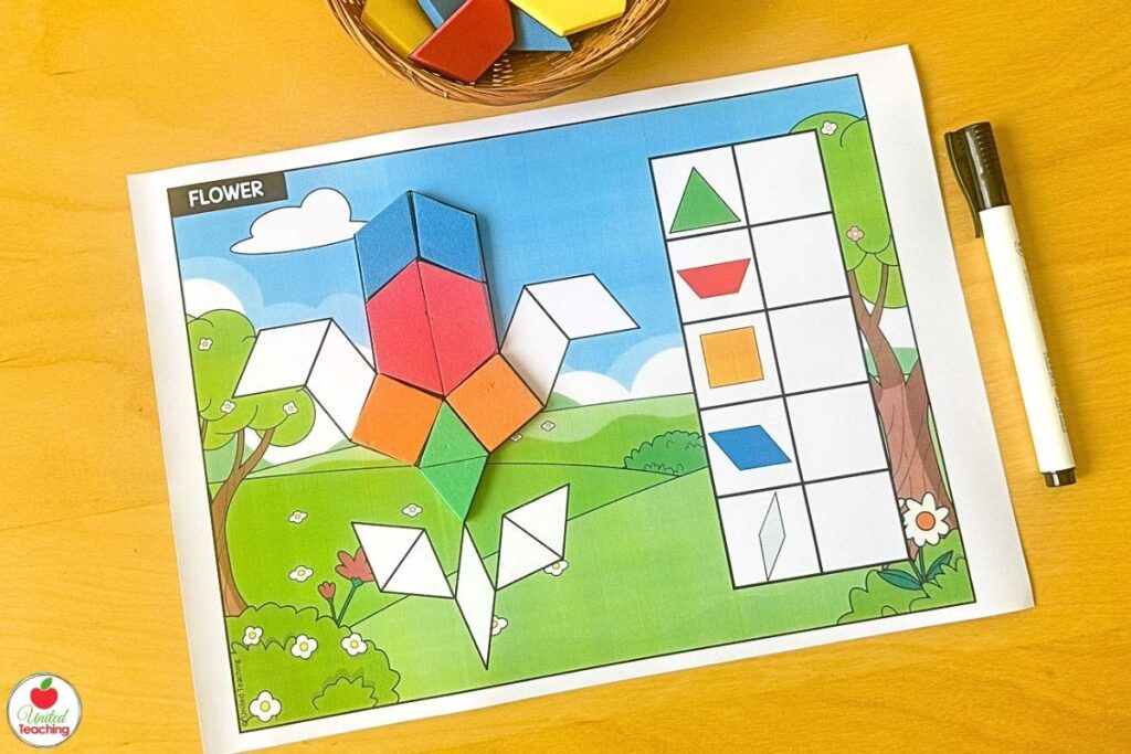 Partially completed spring flower pattern block mat with a garden background, where students build the flower shape from blocks and count each shape used in the recording table