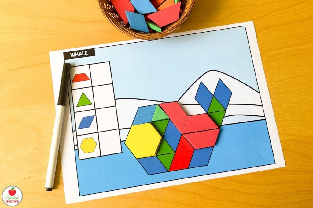Whale pattern block mat with a polar ocean scene, where students build the whale shape from blocks and count each shape used in the recording table