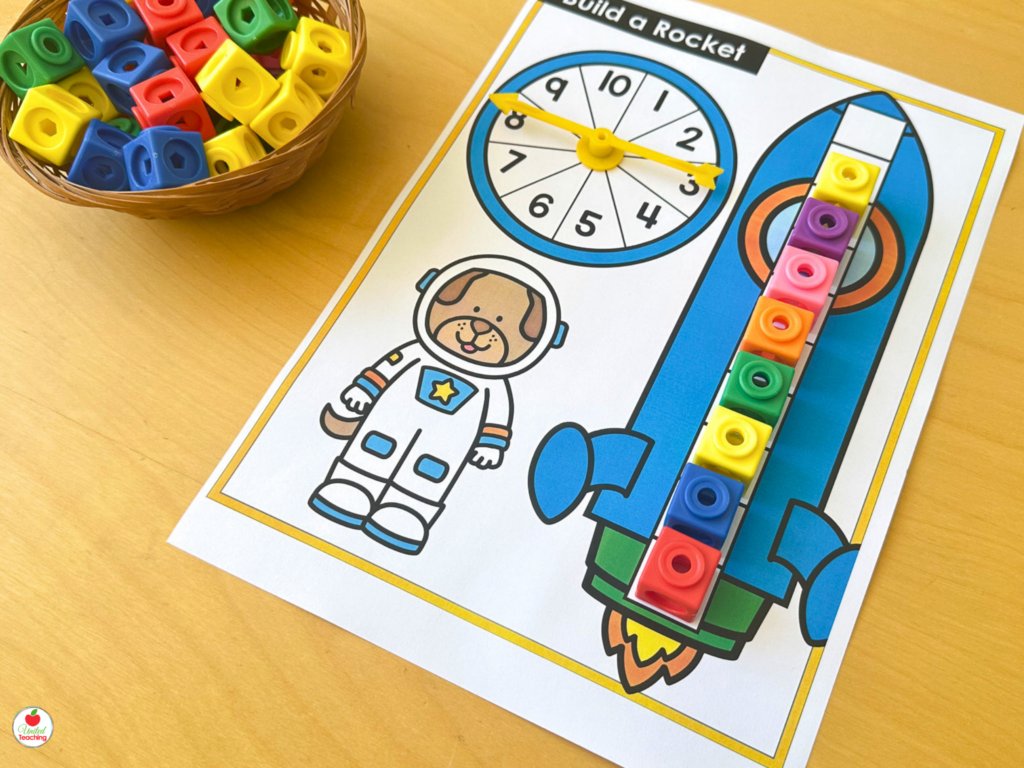 Build a Rocket activity mat for numbers 1-10 with a dog astronaut theme and a full column of math cubes on the rocket