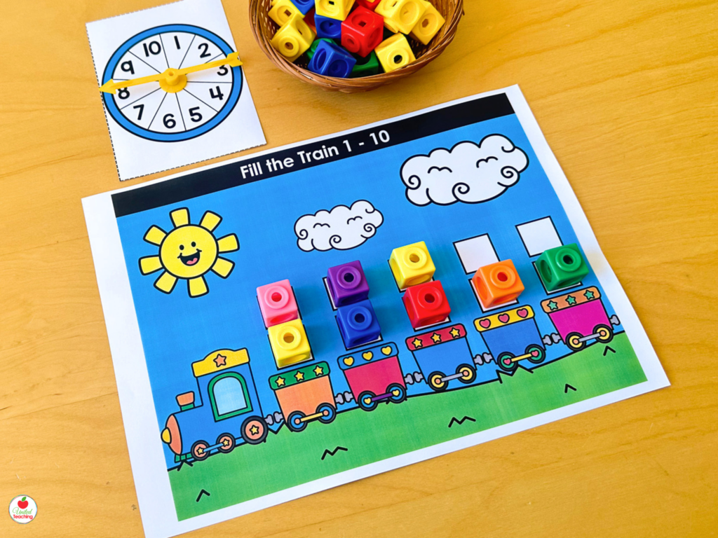 Fill the Train activity mat for numbers 1-10 with colorful math cubes stacked in each train carriage for counting practice