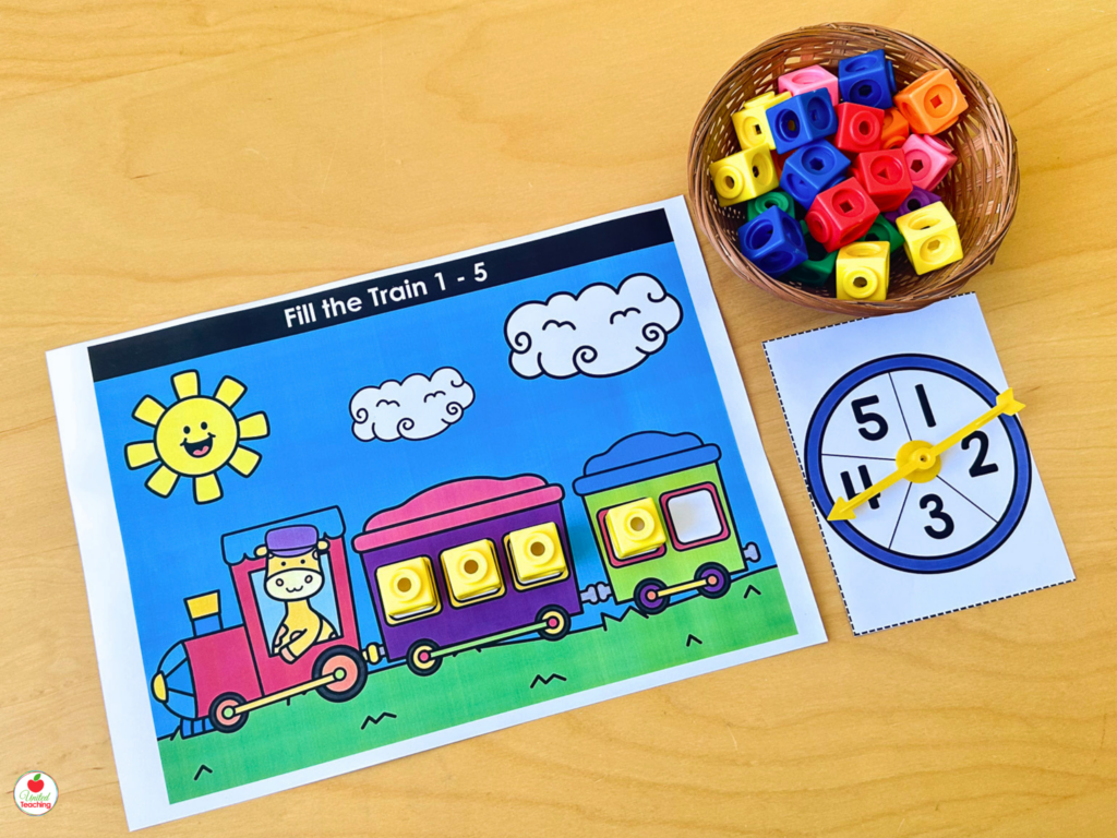 Fill the Train activity mat for numbers 1-5 with math cubes filling train carriages and a number spinner