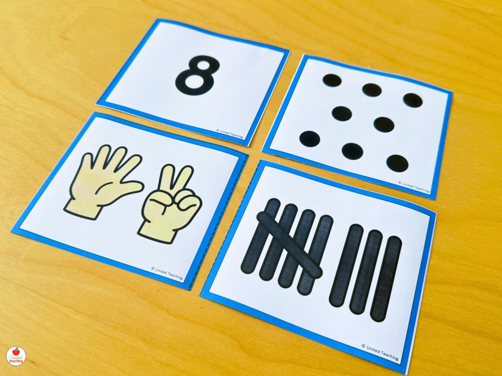 Number 8 representation cards showing four ways to represent the number: numeral, dot pattern, finger pattern, and tally marks