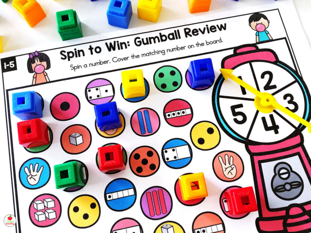 Spin to Win Gumball Review spinner game for numbers 1-5 with math cubes covering multiple number representations on the game board