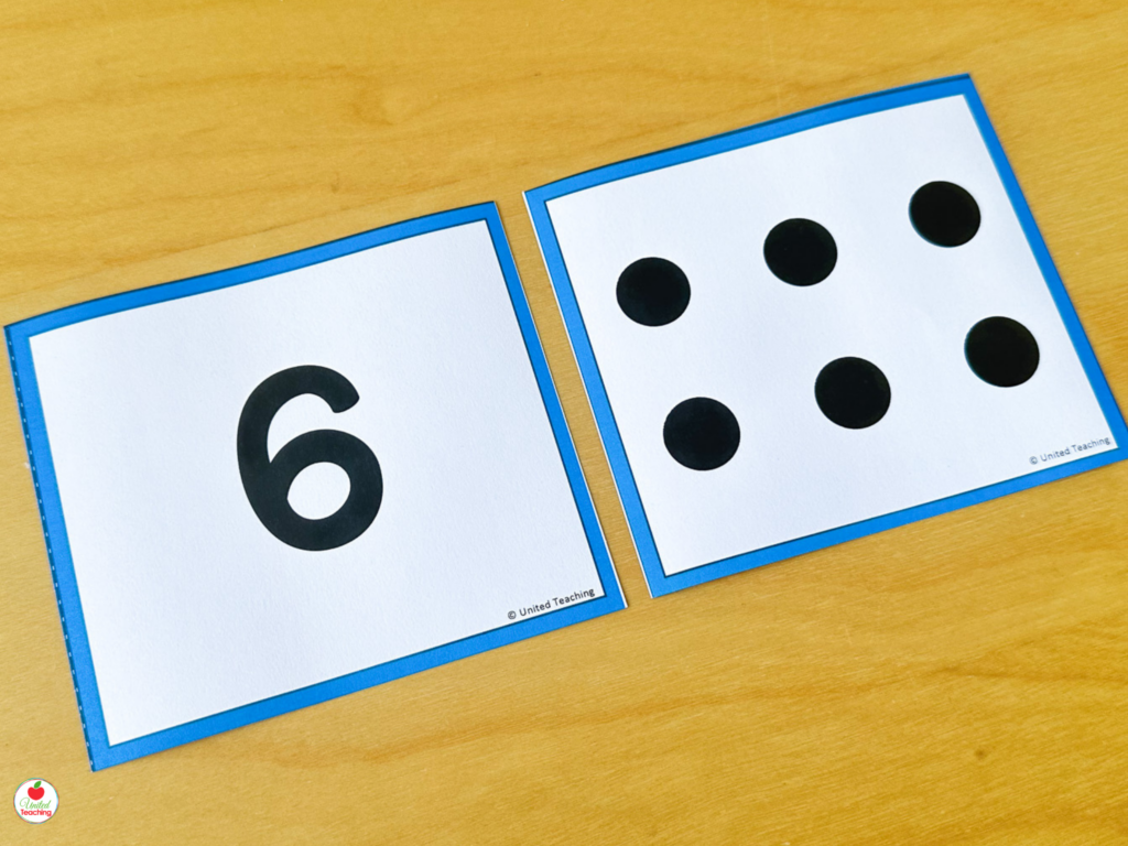 Subitizing flash cards showing the numeral 6 alongside a matching dot pattern for kindergarten number recognition practice