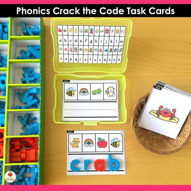 Phonics Crack the Code Task Cards Bundle blends activity with yellow photo box and magnetic letters spelling crab