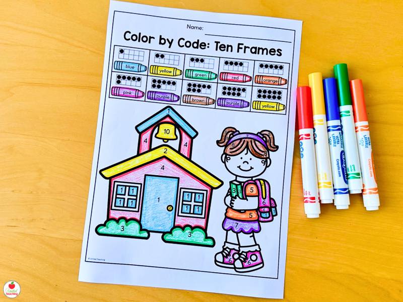 Color by Code Ten Frames worksheet revealing a schoolhouse and student picture using ten frame color clues