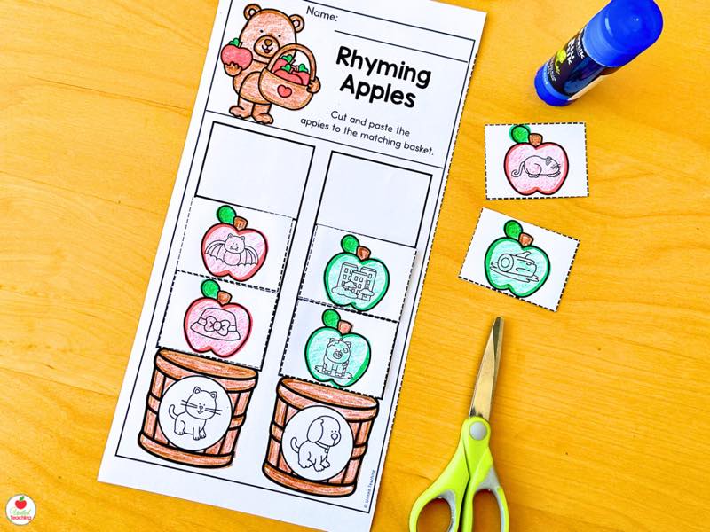 Rhyming Apples worksheet with students sorting rhyming picture apples into matching baskets