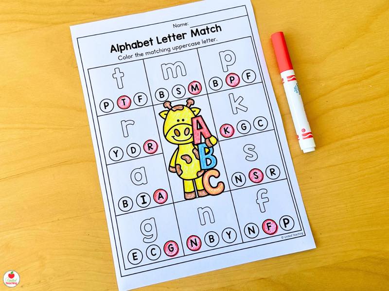 Roll and Trace letter A worksheet with color coded dice for letter formation practice