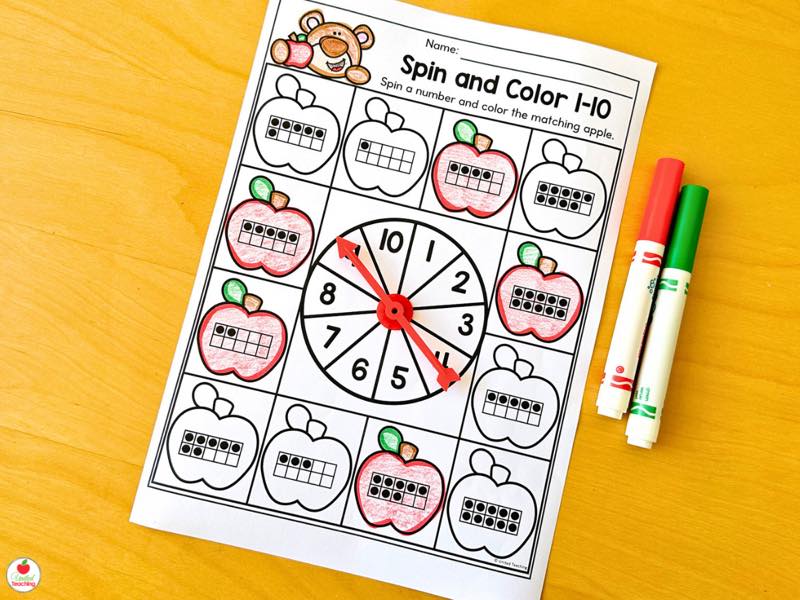 Spin and Color 1 to 10 worksheet with a spinner and apples colored to match the ten frame count