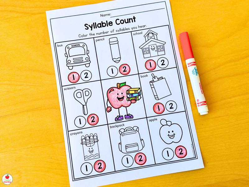 Syllable Count worksheet with back to school pictures like bus, pencil, and backpack