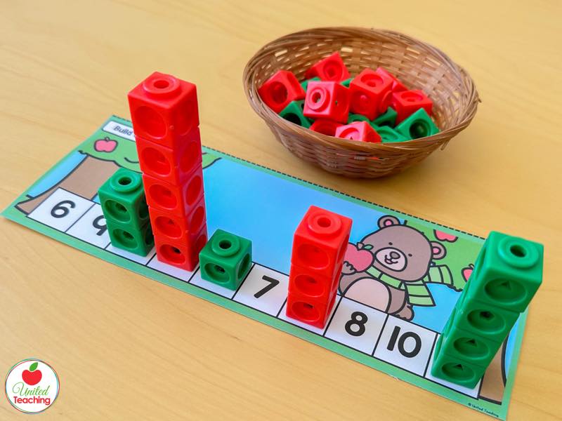 Apple Build an Orchard number strip with red and green math cube towers on numbers 6 to 10