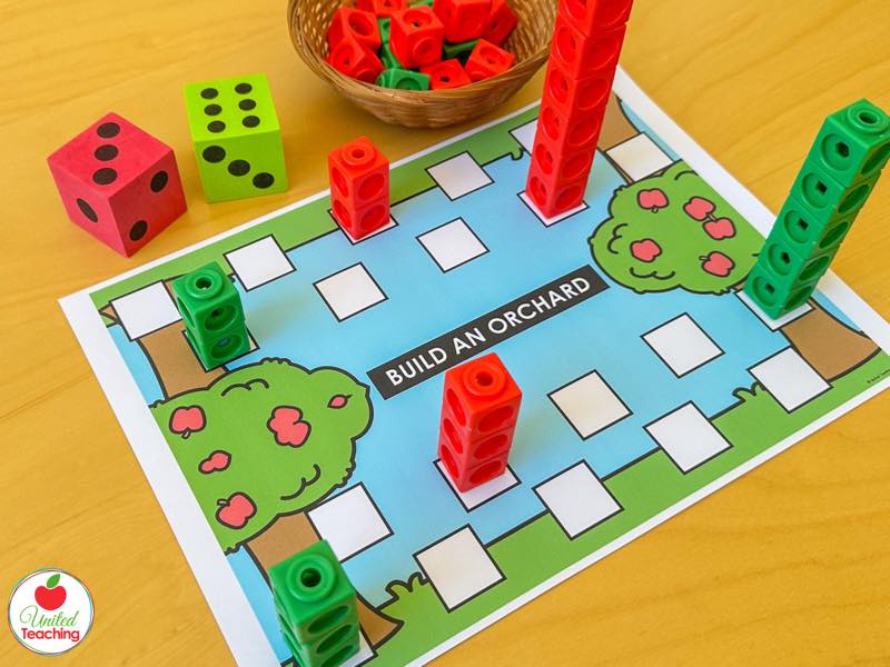 Build an Orchard apple partner game board with two dice and red and green math cube towers