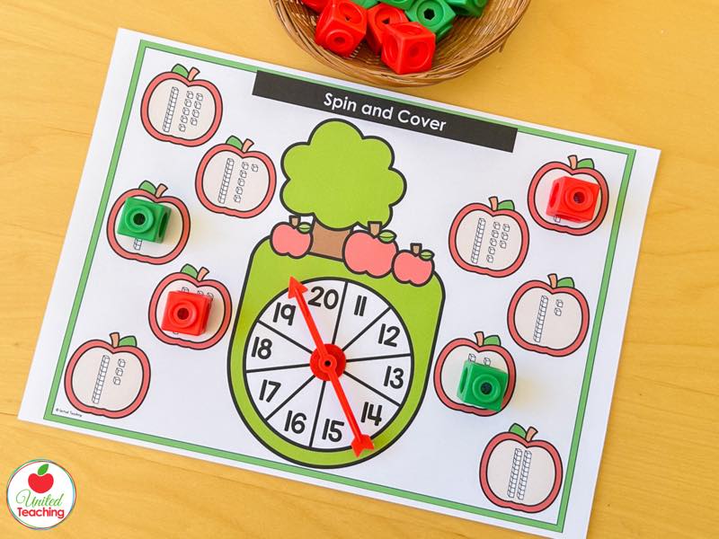 Apple Spin and Cover mat for 11 to 20 with base ten block apples and red and green math cubes