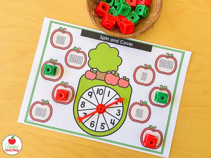 Apple Spin and Cover mat for 1 to 10 with tally mark apples and red and green math cubes