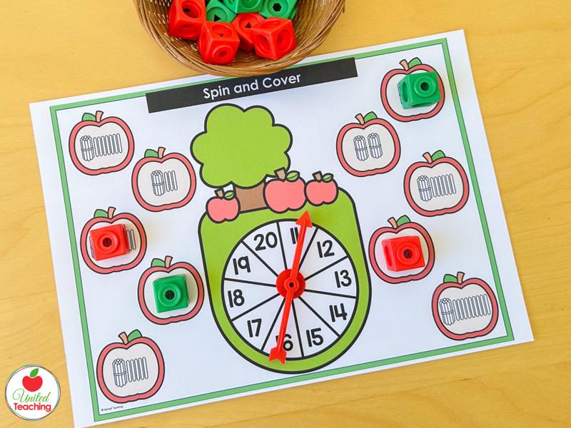 Apple Spin and Cover mat for 11 to 20 with tally mark apples and red and green math cubes