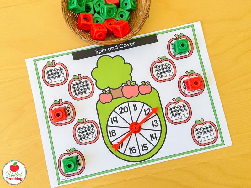 Apple Spin and Cover mat for 11 to 20 with double ten frame apples and red and green math cubes
