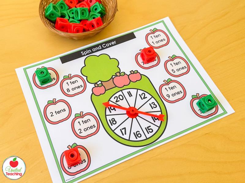 Apple Spin and Cover mat for 11 to 20 with tens and ones apples and red and green math cubes