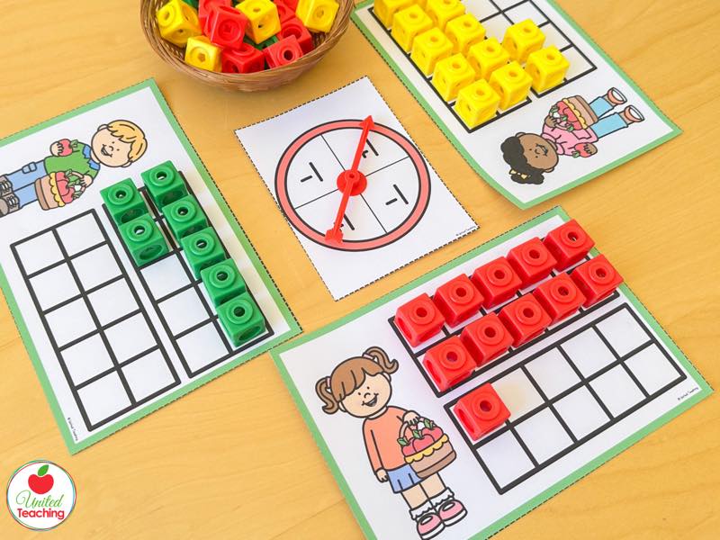 Apple ten frame building task cards with an extension spinner and math cubes filling the frames