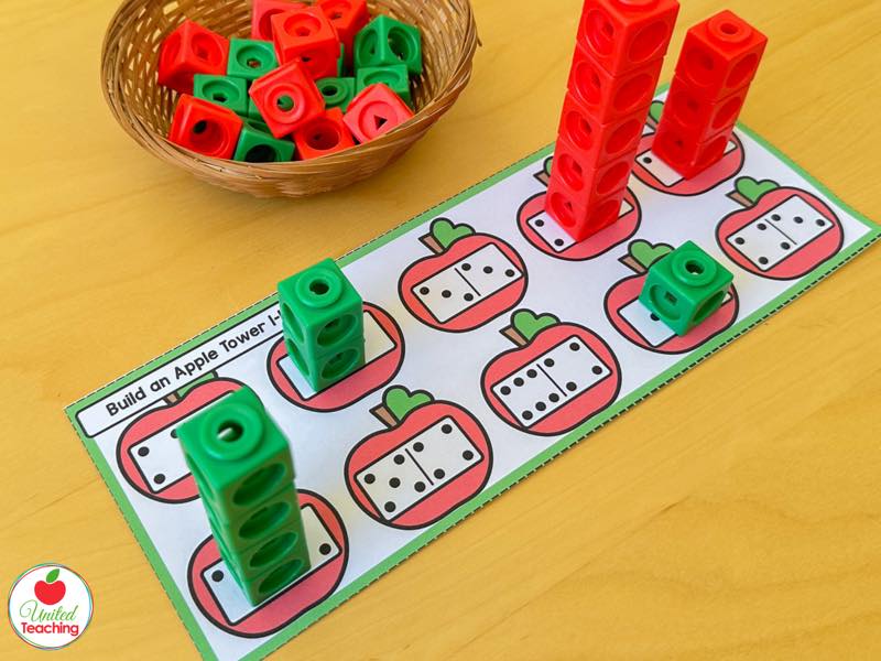 Apple tower mat with domino apples and red and green math cube towers built to match