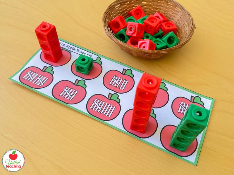 Apple tower mat with tally mark apples and red and green math cube towers built to match