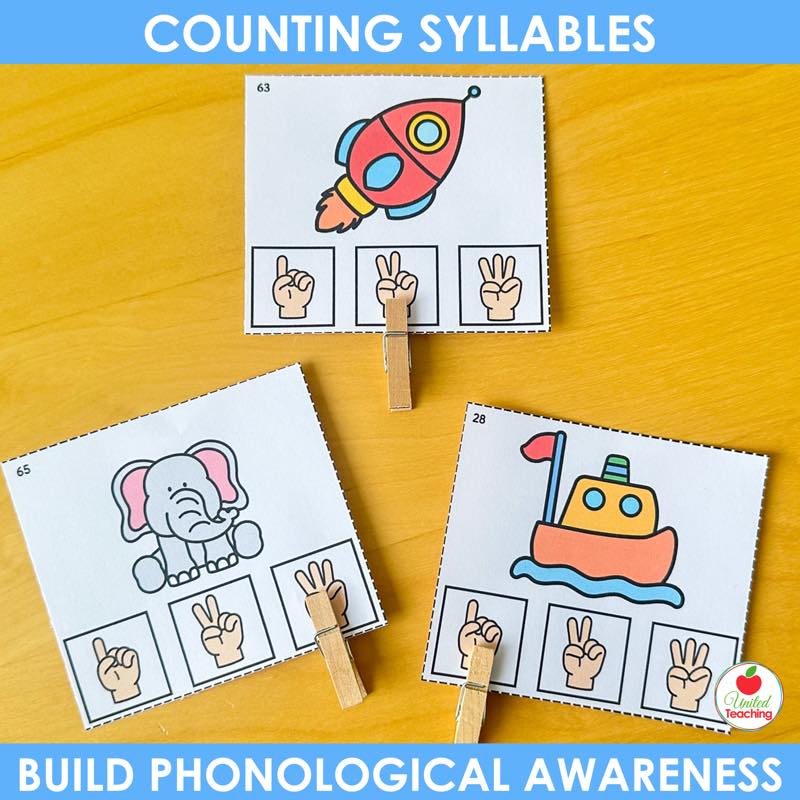 Finger counting syllable clip cards for rocket, elephant and boat with clothespins clipped to the answers