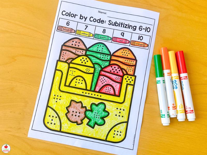 Fall color by code subitizing 6-10 worksheet for kindergarten with dot patterns on a bag of leaves