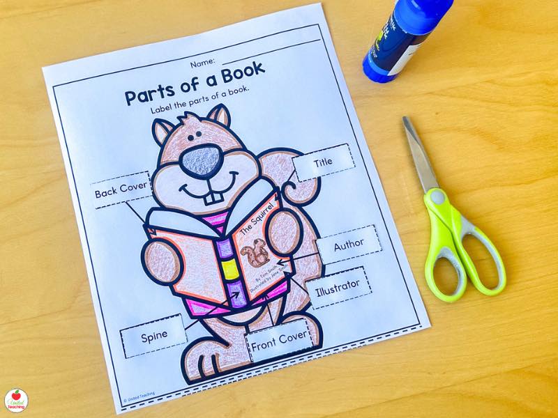 Fall parts of a book worksheet for kindergarten, cut and paste labels onto a squirrel reading a book