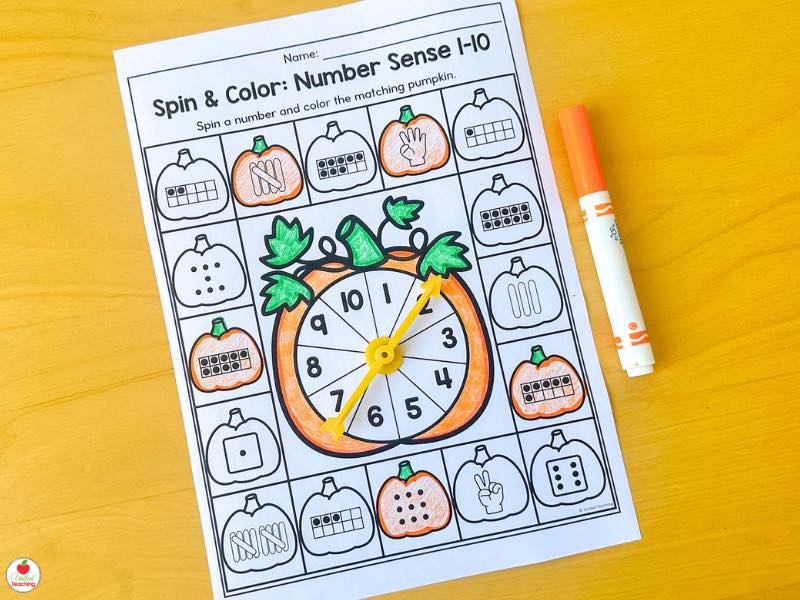 Fall spin and color number sense 1-10 worksheet for kindergarten with a pumpkin spinner