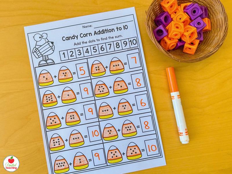 Candy Corn Addition to 10 Halloween worksheet, add the dots and write the sum