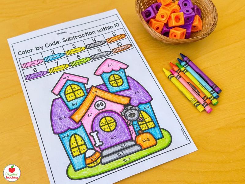Halloween color by code subtraction within 10 worksheet with a colored haunted house