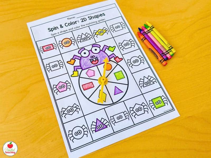 Halloween spin and color 2D shapes worksheet for kindergarten with a spider spinner and crayons