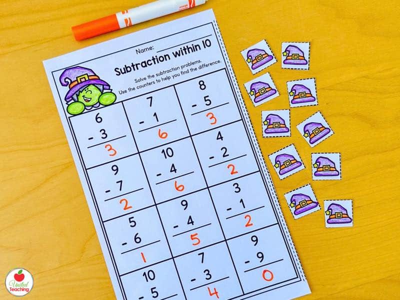 Halloween subtraction within 10 worksheet with witch hat counters for kindergarten