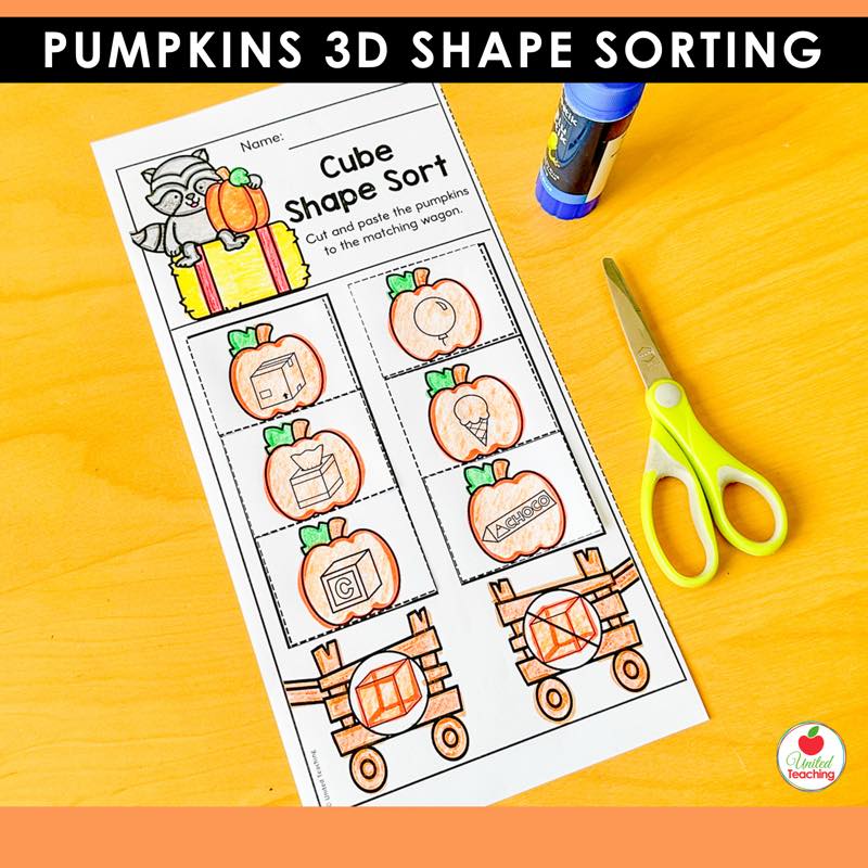 Pumpkins cube shape sorting worksheet with pumpkin picture cards sorted into wagons, scissors and glue