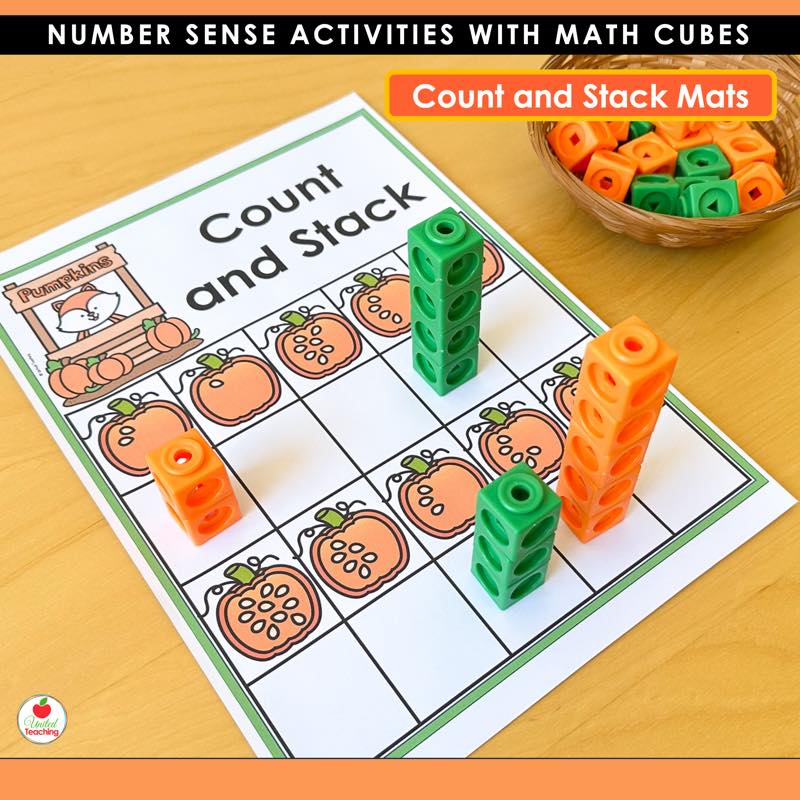 Pumpkin Count and Stack mat with orange and green math cube towers beside pumpkin pictures