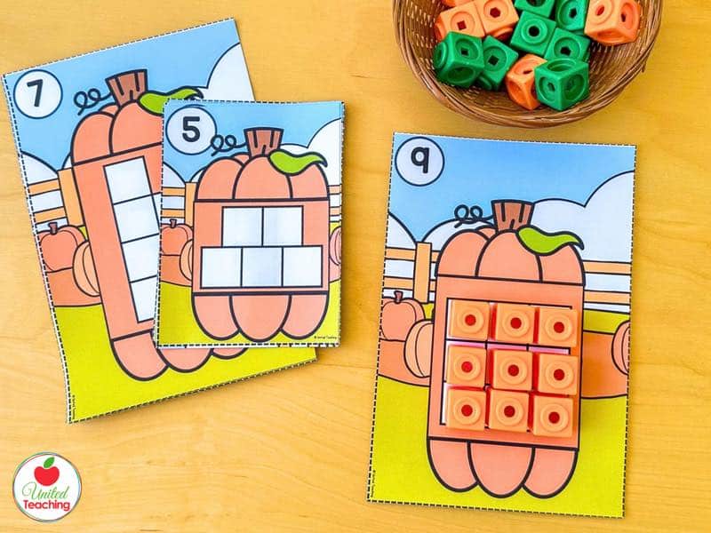 Pumpkin one to one correspondence task cards for 5, 7, and 9 with orange math cubes placed in the spaces