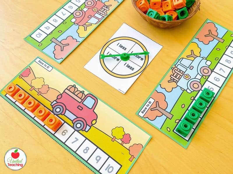 Pumpkin Race to 10 truck game boards with a 1 more 1 less spinner and orange and green math cubes