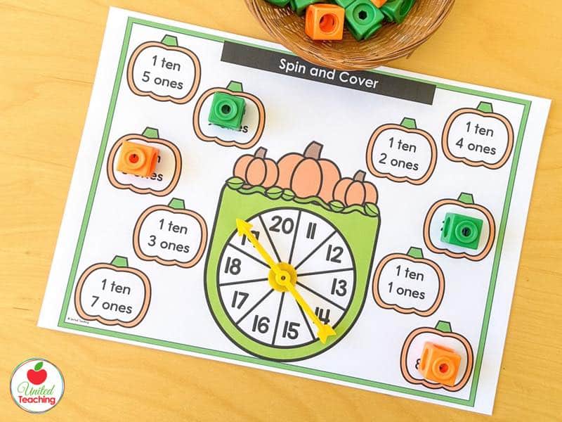 Pumpkin Spin and Cover mat for 11 to 20 with tens and ones pumpkins and orange and green math cubes