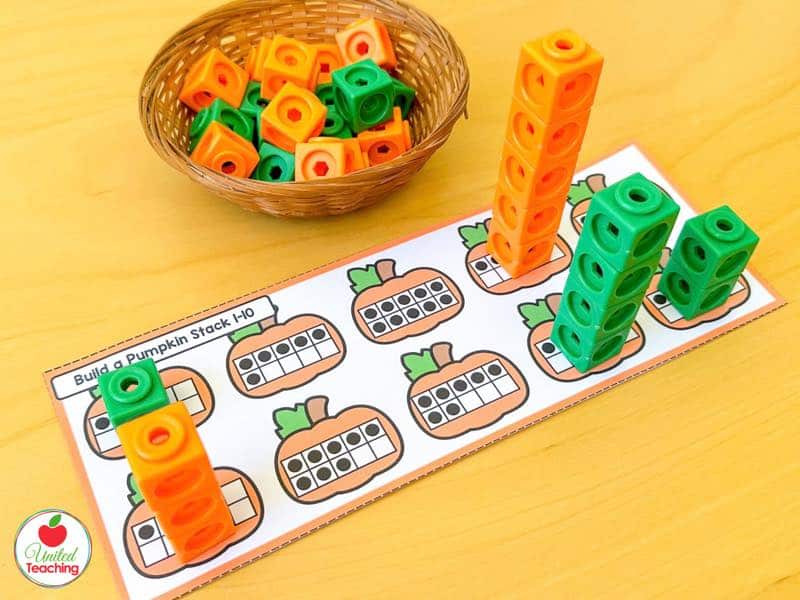 Build a Pumpkin Stack mat with ten frame pumpkins and orange and green math cube towers built to match