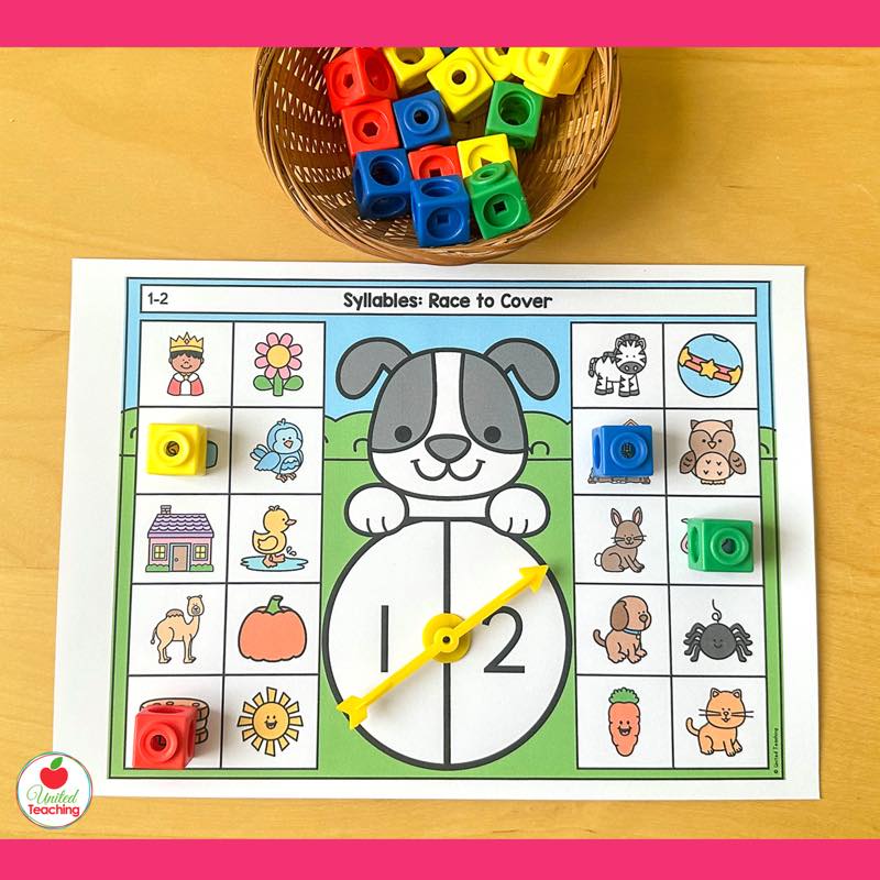 Syllables Race to Cover game for 1 and 2 syllables with a puppy spinner and snap cubes